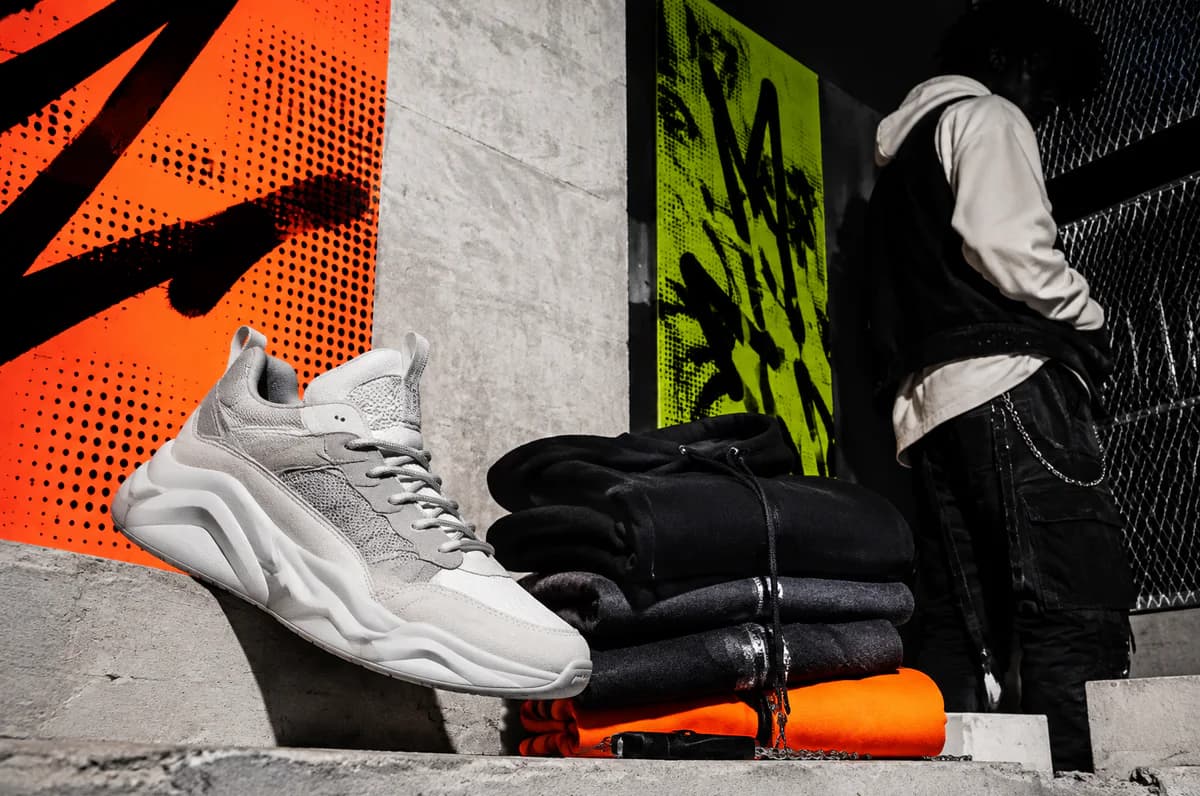 Original unbranded sneaker and streetwear in a black acid-green urban studio